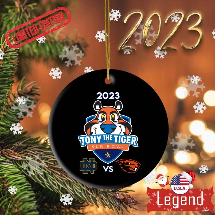 https://images.legendusashirt.com/2023/12/Notre-Dame-Fighting-Irish-Vs-Oregon-State-Beavers-2023-Tony-The-Tiger-Sun-Bowl-Ornament-Ornament-2023-Circle.jpg