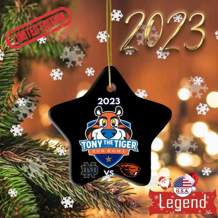 https://images.legendusashirt.com/2023/12/Notre-Dame-Fighting-Irish-Vs-Oregon-State-Beavers-2023-Tony-The-Tiger-Sun-Bowl-Ornament-Ornament-2023-Star.jpg