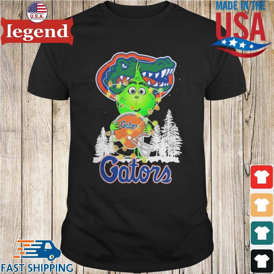 The Baby Grinch Hug Florida Gators Helmet Christmas 2024 Sweater